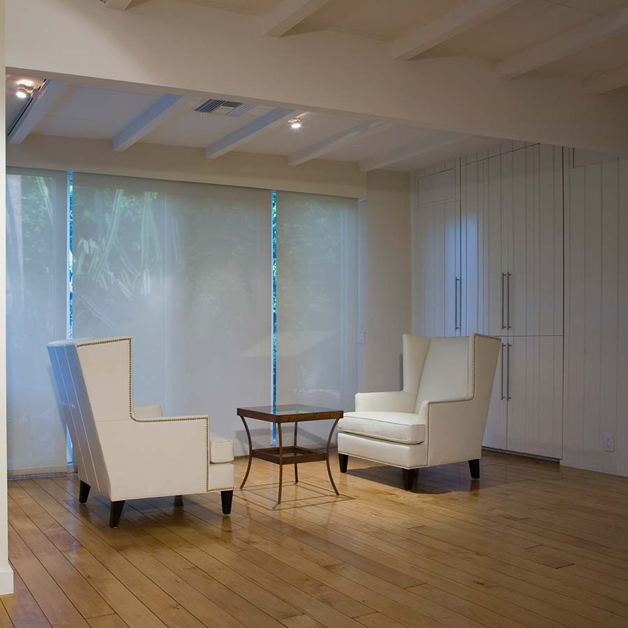 Energy Efficient Window Treatments like these Solar Shades block out harmful UV rays.